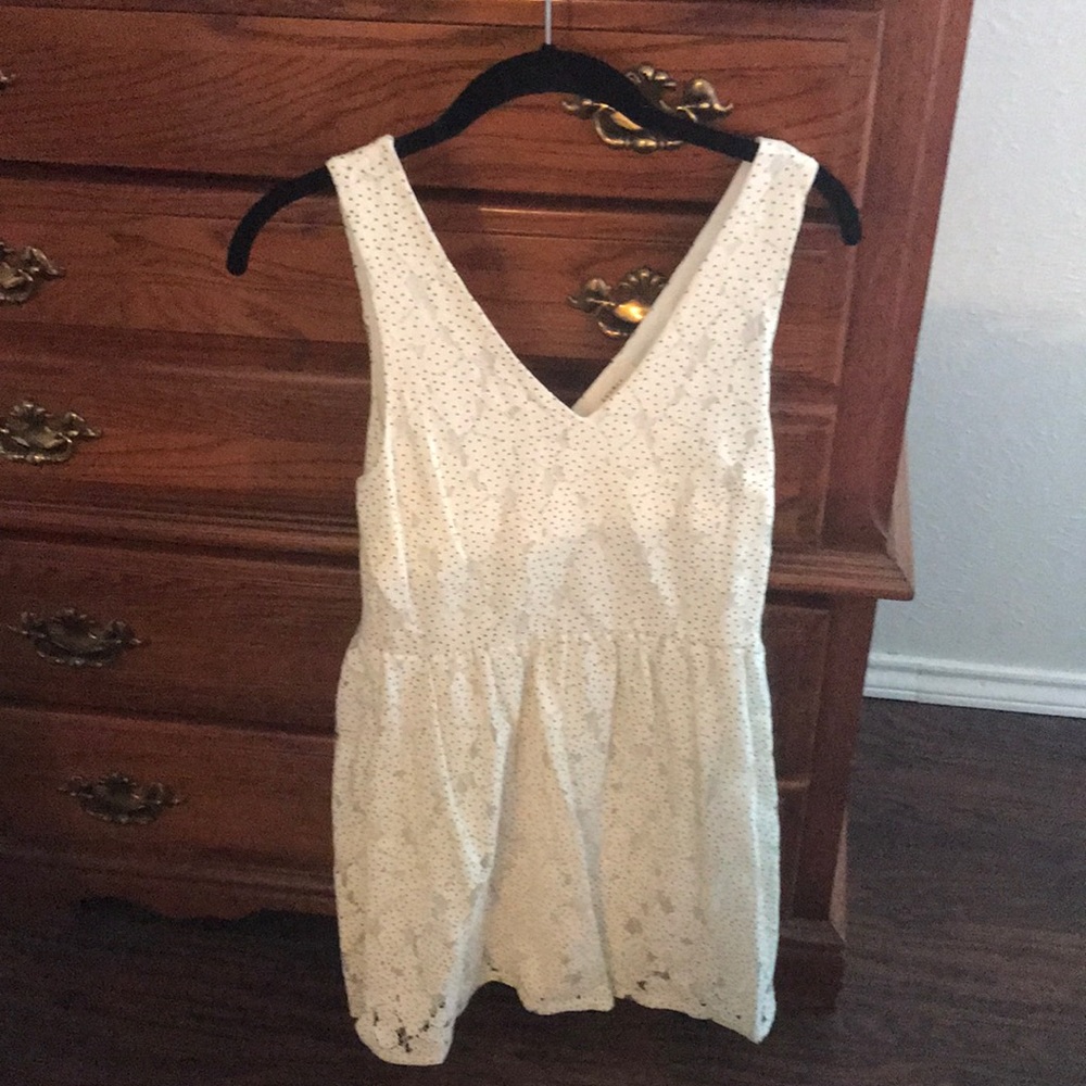 Everly- small white dress with black polka dots.